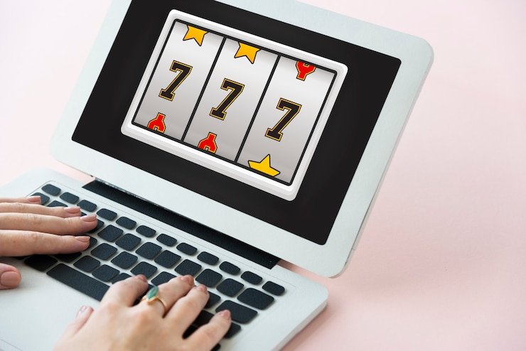 Starburst slot reel display showing wild symbols and payline structure on winstar login